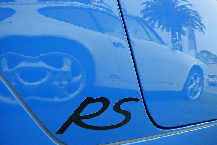 Don T's Grand Prix White RSA reflected in Warren G's Maritime blue example at the Ventura German AutoFest Sep 2003.